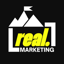 real. Marketing Logo